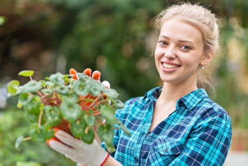 Person reviewing a landscaping complaint record outdoors